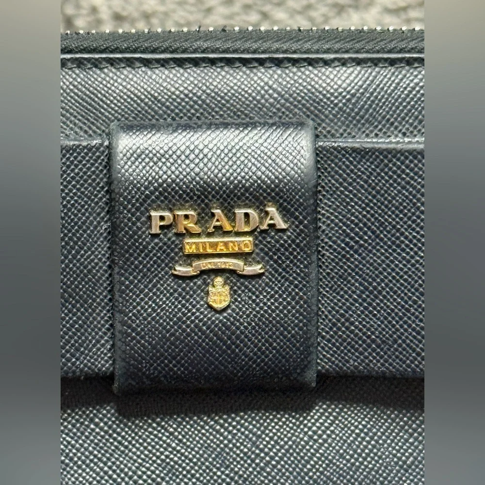 Prada Saffiano leather bow zip around wallet